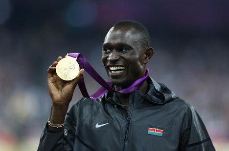 Gold medallist David Lekuta Rudisha of Kenya shows his medal during the presentation ceremony for the men's 800m event at the London 2012 Ol Gold medallist David Lekuta Rudisha of Kenya shows his medal during the presentation ceremony for the men's 800m event at the London 2012 Ol