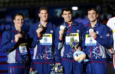 (L-R) Gold medalists Ryan Lochte, Conor Dwyer, Ricky Berens and Charles Gipson Houchin of the U.S. pose with their medals at the men's 4x200 (L-R) Gold medalists Ryan Lochte, Conor Dwyer, Ricky Berens and Charles Gipson Houchin of the U.S. pose with their medals at the men's 4x200