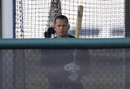 New York Yankees' Alex Rodriguez stands in the batting cage while working out at the teams minor league complex during a rehab assignment in New York Yankees' Alex Rodriguez stands in the batting cage while working out at the teams minor league complex during a rehab assignment in