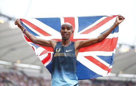 Mo Farah of Britain holds a union flag after winning the men's 3000m at the London Diamond League 'Anniversary Games' athletics meeting at t Mo Farah of Britain holds a union flag after winning the men's 3000m at the London Diamond League 'Anniversary Games' athletics meeting at t
