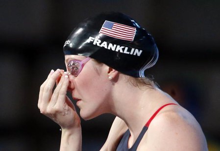 Missy Franklin of the U.S. adjusts a clip in her nose before competing in the women's 200m backstroke semi-final during the World Swimming C Missy Franklin of the U.S. adjusts a clip in her nose before competing in the women's 200m backstroke semi-final during the World Swimming C