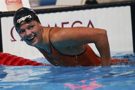 Russia's Yuliya Efimova celebrates after setting a new world record in the women's 50m breaststroke heats during the World Swimming Champion Russia's Yuliya Efimova celebrates after setting a new world record in the women's 50m breaststroke heats during the World Swimming Champion