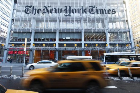 Vehicles drive past the New York Times headquarters in New York March 1, 2010. REUTERS/Lucas Jackson Vehicles drive past the New York Times headquarters in New York March 1, 2010. REUTERS/Lucas Jackson