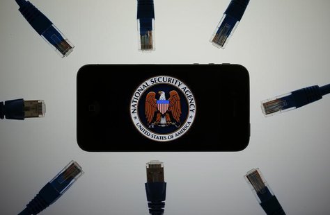 An illustration picture shows the logo of the U.S. National Security Agency on the display of an iPhone in Berlin, June 7, 2013. REUTERS/Paw An illustration picture shows the logo of the U.S. National Security Agency on the display of an iPhone in Berlin, June 7, 2013. REUTERS/Paw