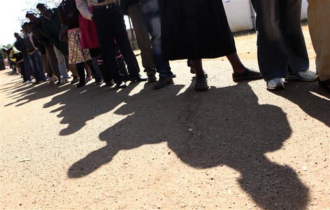 Zimbabweans arrive to cast their votes at a polling station in Harare July 31, 2013. REUTERS/Philimon Bulawayo Zimbabweans arrive to cast their votes at a polling station in Harare July 31, 2013. REUTERS/Philimon Bulawayo