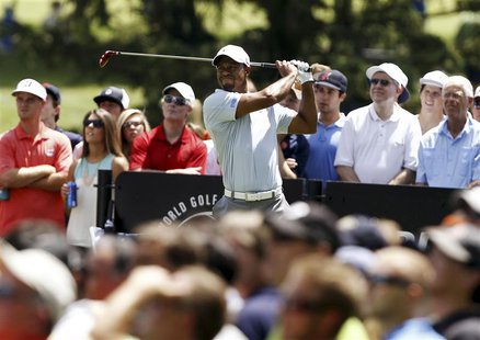 Tiger Woods of the U.S. watches his tee shot on the third hole during the third round of the WGC-Bridgestone Invitational golf tournament in Tiger Woods of the U.S. watches his tee shot on the third hole during the third round of the WGC-Bridgestone Invitational golf tournament in