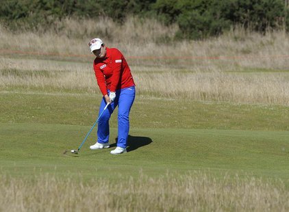 South Korea's Inbee Park plays her approach shot to the 16th hole during the Women's British Open golf championship at St Andrews in Scotlan South Korea's Inbee Park plays her approach shot to the 16th hole during the Women's British Open golf championship at St Andrews in Scotlan