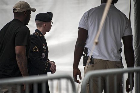 U.S. Army Private First Class Bradley Manning is escorted into court for the second day of the sentencing phase in his military trial at For U.S. Army Private First Class Bradley Manning is escorted into court for the second day of the sentencing phase in his military trial at For