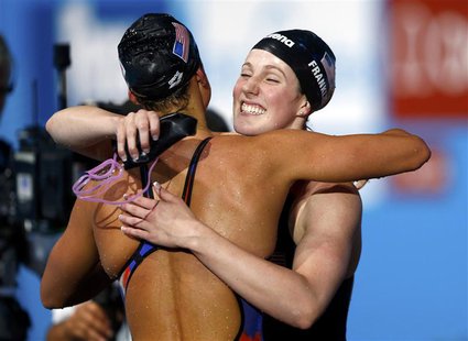 Missy Franklin of the U.S. (R) hugs her team mate Megan Romano after winning the women's 4x100m medley final during the World Swimming Champ Missy Franklin of the U.S. (R) hugs her team mate Megan Romano after winning the women's 4x100m medley final during the World Swimming Champ