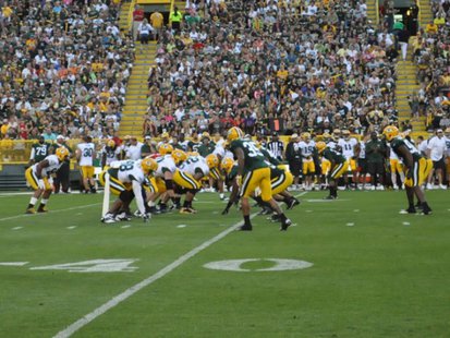 Packers players line up on both sides of the ball during the annual Family Night scrimmage on Saturday August 3, 2013. (Photo by: FOX 11) Packers players line up on both sides of the ball during the annual Family Night scrimmage on Saturday August 3, 2013. (Photo by: FOX 11)