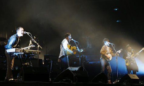 Mumford & Sons, (from L) Ben Lovett , Marcus Mumford, Winston Marshall and Ted Dwane perform on the Pyramid Stage at the Glastonbury music f Mumford & Sons, (from L) Ben Lovett , Marcus Mumford, Winston Marshall and Ted Dwane perform on the Pyramid Stage at the Glastonbury music f