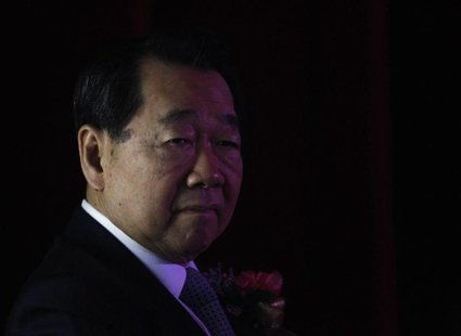 Dhanin Chearavanont, chairman of Thailand's largest agribusiness group, Charoen Pokphand Foods, arrives at a Thailand-China Business Council Dhanin Chearavanont, chairman of Thailand's largest agribusiness group, Charoen Pokphand Foods, arrives at a Thailand-China Business Council