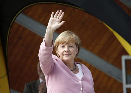 German Chancellor Angela Merkel waves during a Christian Democratic Union (CDU) election campaign rally in Heringsdorf at the Baltic sea Jul German Chancellor Angela Merkel waves during a Christian Democratic Union (CDU) election campaign rally in Heringsdorf at the Baltic sea Jul