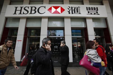 People walk outside one of the branches of HSBC in Hong Kong March 4, 2013. REUTERS/Bobby Yip People walk outside one of the branches of HSBC in Hong Kong March 4, 2013. REUTERS/Bobby Yip