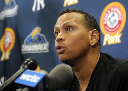 New York Yankee's Alex Rodriguez answers questions at a news conference after playing for the Trenton Thunder in their rehab minor league ba New York Yankee's Alex Rodriguez answers questions at a news conference after playing for the Trenton Thunder in their rehab minor league ba