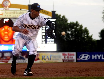 New York Yankee Alex Rodriguez fields a ground ball as he plays for the Trenton Thunder in the third inning of their rehab minor league base New York Yankee Alex Rodriguez fields a ground ball as he plays for the Trenton Thunder in the third inning of their rehab minor league base