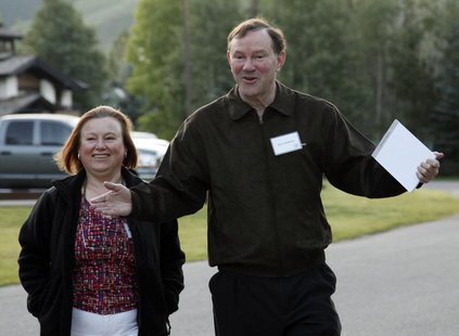 Donald Graham, Chairman and CEO of the Washington Post Co, arrives with an unidentified woman at the Sun Valley Inn in Sun Valley, Idaho Jul Donald Graham, Chairman and CEO of the Washington Post Co, arrives with an unidentified woman at the Sun Valley Inn in Sun Valley, Idaho Jul
