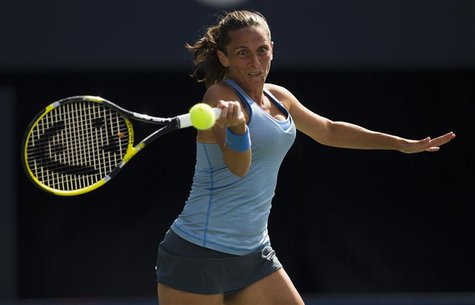Roberta Vinci of Italy returns a shot to Julia Goerges of Germany during their first round match at the Rogers Cup tennis tournament in Toro Roberta Vinci of Italy returns a shot to Julia Goerges of Germany during their first round match at the Rogers Cup tennis tournament in Toro