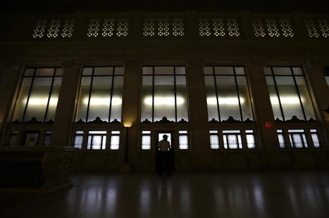 A guard passes a doorway in the foyer of the old Post Office building in Washington, D.C. July 10, 2012. REUTERS/Kevin Lamarque A guard passes a doorway in the foyer of the old Post Office building in Washington, D.C. July 10, 2012. REUTERS/Kevin Lamarque