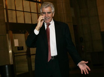 Former Republican New York State Senate majority leader Joseph Bruno talks on the phone upon entering the Capitol building in Albany, New Yo Former Republican New York State Senate majority leader Joseph Bruno talks on the phone upon entering the Capitol building in Albany, New Yo