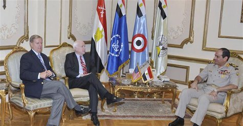 Egypt's Armed Forces General Abdel Fattah al-Sisi (R) meets with U.S. Senators' John McCain (C) and Lindsey Graham at the Ministry of Defens Egypt's Armed Forces General Abdel Fattah al-Sisi (R) meets with U.S. Senators' John McCain (C) and Lindsey Graham at the Ministry of Defens