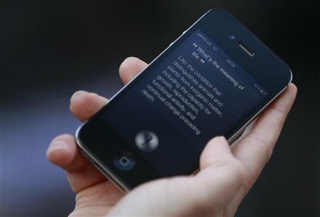 Luke Peters demonstrates Siri, an application which uses voice recognition and detection on the iPhone 4S, outside the Apple store in Covent Luke Peters demonstrates Siri, an application which uses voice recognition and detection on the iPhone 4S, outside the Apple store in Covent