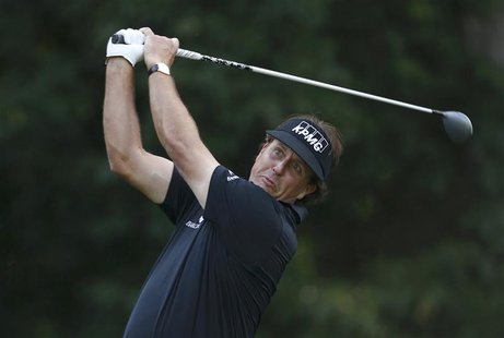 Phil Mickelson of the U.S. tees off on the fourth hole during a practice round for the 2013 PGA Championship golf tournament at Oak Hill Cou Phil Mickelson of the U.S. tees off on the fourth hole during a practice round for the 2013 PGA Championship golf tournament at Oak Hill Cou