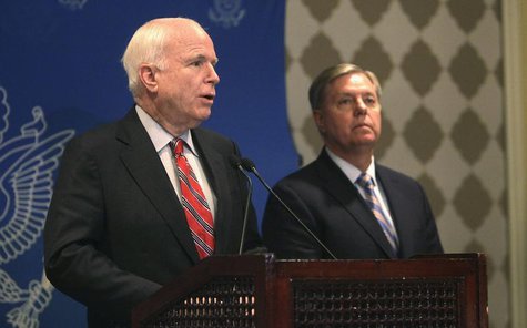 U.S. Senator John McCain speaks as compatriot Senator Lindsey Graham (R) looks on during a news conference in Cairo, August 6, 2013. REUTERS U.S. Senator John McCain speaks as compatriot Senator Lindsey Graham (R) looks on during a news conference in Cairo, August 6, 2013. REUTERS