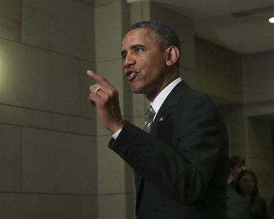 U.S. President Barack Obama speaks to the media after departing from a meeting with House Democrats at the Capitol Visitor's Center in Washi U.S. President Barack Obama speaks to the media after departing from a meeting with House Democrats at the Capitol Visitor's Center in Washi