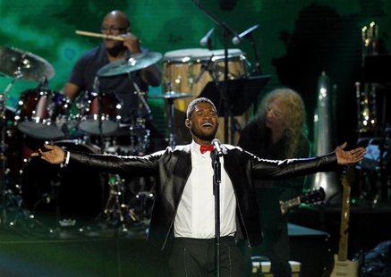Usher performs during Quincy Jones' induction at the 2013 Rock and Roll Hall of Fame induction ceremony in Los Angeles April 18, 2013. REUTE Usher performs during Quincy Jones' induction at the 2013 Rock and Roll Hall of Fame induction ceremony in Los Angeles April 18, 2013. REUTE