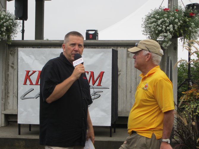 Tom talking with Bill Colson, Executive Director of Children's Home Society