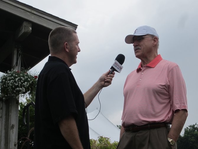 Tom talking with CEO of Orion Foods Hank Suerth