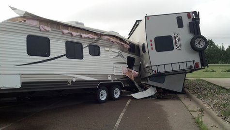 Storm damages vehicles in the parking lot of Quality RV in Kaukauna on August 7, 2013. (Photo by: Jeff Flynt). Storm damages vehicles in the parking lot of Quality RV in Kaukauna on August 7, 2013. (Photo by: Jeff Flynt).