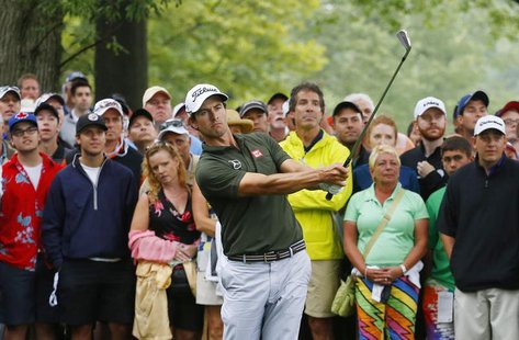 Australia's Adam Scott hits from the rough on the eighth hole during the second round of the 2013 PGA Championship golf tournament at Oak Hi Australia's Adam Scott hits from the rough on the eighth hole during the second round of the 2013 PGA Championship golf tournament at Oak Hi