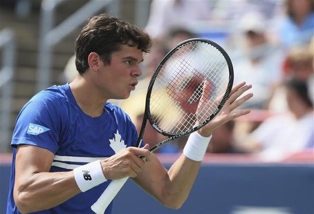 Milos Raonic of Canada gestures during his quarter-final match against Ernests Gulbis of Latvia at the men's Rogers Cup tennis tournament in Milos Raonic of Canada gestures during his quarter-final match against Ernests Gulbis of Latvia at the men's Rogers Cup tennis tournament in