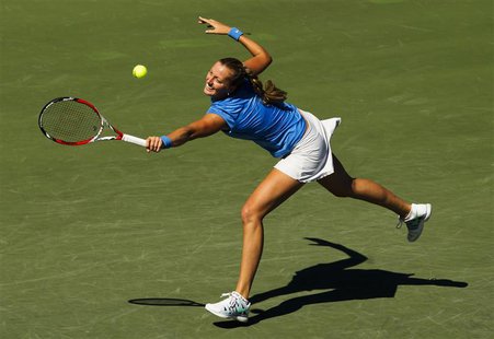 Petra Kvitova of the Czech Republic returns a shot to Sorana Cirstea of Romania during their women's quarter-finals tennis match of the Roge Petra Kvitova of the Czech Republic returns a shot to Sorana Cirstea of Romania during their women's quarter-finals tennis match of the Roge