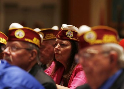 Members listen to U.S. President Barack Obama talk at the Disabled American Veterans' National Convention in Orlando, August 10, 2013. REUTE Members listen to U.S. President Barack Obama talk at the Disabled American Veterans' National Convention in Orlando, August 10, 2013. REUTE