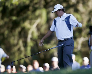 Jason Dufner of the U.S. drops his club after his tee shot on the 18th hole during the third round of the 2013 PGA Championship golf tournam Jason Dufner of the U.S. drops his club after his tee shot on the 18th hole during the third round of the 2013 PGA Championship golf tournam