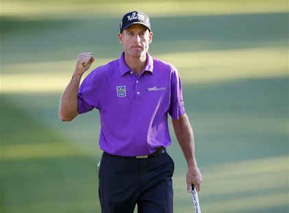 Jim Furyk of the U.S. reacts after making his par putt on the 18th green during the third round of the 2013 PGA Championship golf tournament Jim Furyk of the U.S. reacts after making his par putt on the 18th green during the third round of the 2013 PGA Championship golf tournament