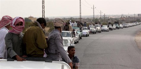 A funeral convoy carrying the bodies of four Islamist militants drives through Sheikh Zuweid, in the north of the Sinai peninsula, August 10 A funeral convoy carrying the bodies of four Islamist militants drives through Sheikh Zuweid, in the north of the Sinai peninsula, August 10