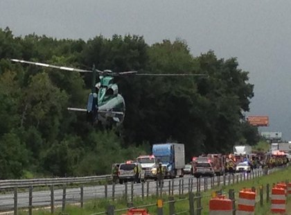 Air Ambulance arrives to carry most seriously injured to emergency. Air Ambulance arrives to carry most seriously injured to emergency.