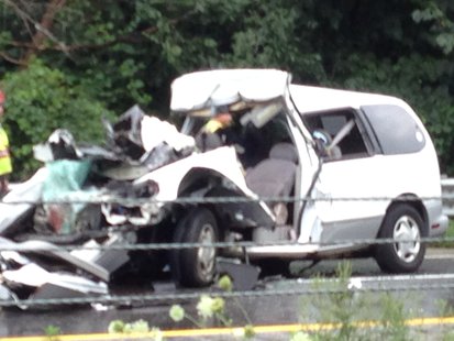 It appears the van was pried open to extract the victims. It appears the van was pried open to extract the victims.