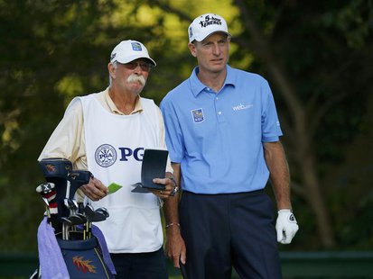 Jim Furyk (R) of the U.S. stands on the 15th tee with his caddie, Mike Cowan, during the final round of the 2013 PGA Championship golf tourn Jim Furyk (R) of the U.S. stands on the 15th tee with his caddie, Mike Cowan, during the final round of the 2013 PGA Championship golf tourn