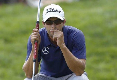 Australia's Adam Scott looks at his putt on the third hole during the final round of the 2013 PGA Championship golf tournament at Oak Hill C Australia's Adam Scott looks at his putt on the third hole during the final round of the 2013 PGA Championship golf tournament at Oak Hill C