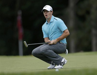 Northern Ireland's Rory McIlroy reacts after missing a birdie putt on the second hole during the final round of the 2013 PGA Championship go Northern Ireland's Rory McIlroy reacts after missing a birdie putt on the second hole during the final round of the 2013 PGA Championship go