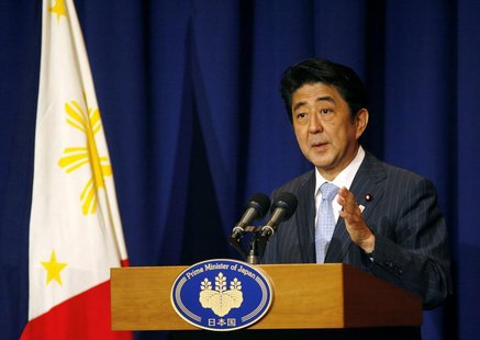 Japan's Prime Minister Shinzo Abe gestures during a news conference at a hotel in Makati city, metro Manila July 27, 2013. REUTERS/Al Falcon Japan's Prime Minister Shinzo Abe gestures during a news conference at a hotel in Makati city, metro Manila July 27, 2013. REUTERS/Al Falcon