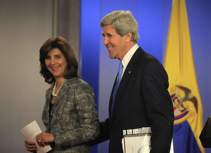 U.S. Secretary of State John Kerry smiles with Colombia's Foreign Minister Maria Angela Holguin after a news conference at the presidential U.S. Secretary of State John Kerry smiles with Colombia's Foreign Minister Maria Angela Holguin after a news conference at the presidential