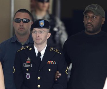 U.S. Army Private First Class Bradley Manning (C) departs the courthouse at Fort Meade, Maryland July 30, 2013. REUTERS/Gary Cameron U.S. Army Private First Class Bradley Manning (C) departs the courthouse at Fort Meade, Maryland July 30, 2013. REUTERS/Gary Cameron
