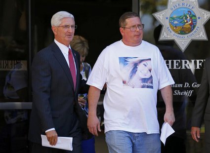 Brett Anderson, the father of kidnap victim Hannah Anderson, 16, (R), flanked by Sheriff Bill Gore walks out to speak to the media following Brett Anderson, the father of kidnap victim Hannah Anderson, 16, (R), flanked by Sheriff Bill Gore walks out to speak to the media following