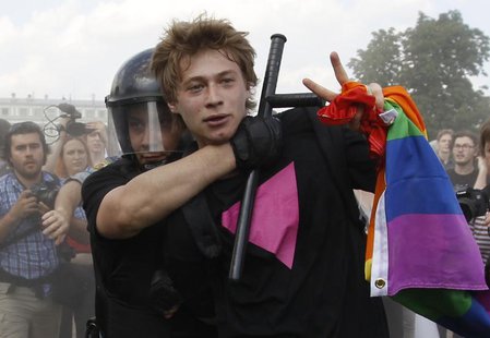 Police detain a gay rights activist during a Gay Pride event in St. Petersburg, June 29, 2013. REUTERS/Alexander Demianchuk Police detain a gay rights activist during a Gay Pride event in St. Petersburg, June 29, 2013. REUTERS/Alexander Demianchuk
